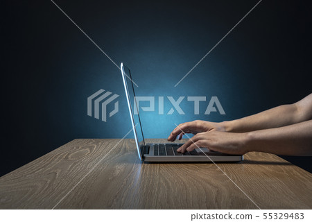 Computer and hand 55329483