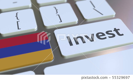 INVEST text and flag of Armenia on the buttons on the computer keyboard. Business related conceptual 55329697