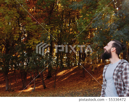 fall landscape happy male tourist nature park 55336472