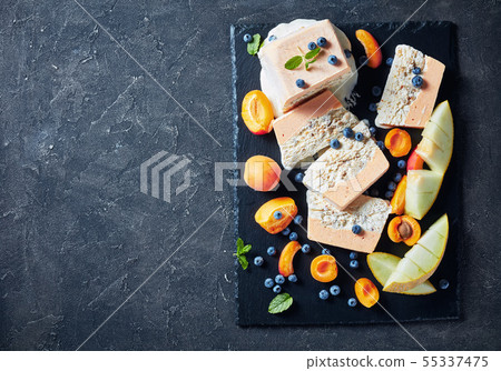 Sicilian Almond Semifreddo with apricot and melon Sicilian Almond Semifreddo with apricot and melon 55337475