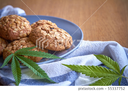 Close-up of a few oatmeal pot cookies on a gray Close-up of a few oatmeal pot cookies on a gray 55337752