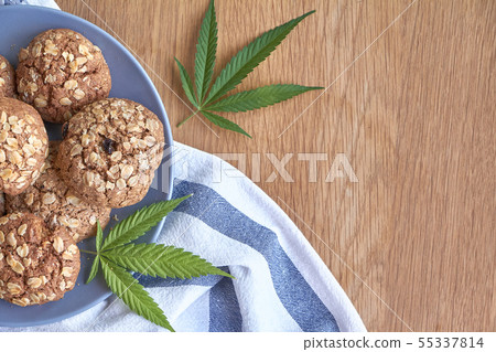 Top view of a few oatmeal pot cookies on a gray Top view of a few oatmeal pot cookies on a gray 55337814