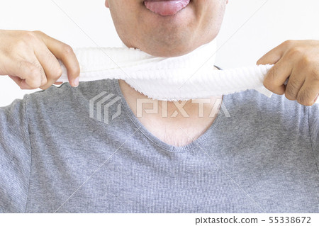 A man strangling himself with a towel A man strangling himself with a towel 55338672