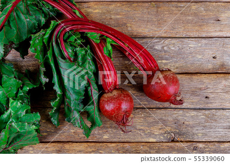 Beets, bunch of fresh organic beetroot on wooden Beets, bunch of fresh organic beetroot on wooden 55339060