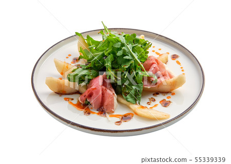 Salad with jamon, pear and arugula isolated on 55339339
