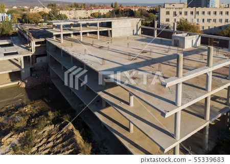 Building construction site work against house Building construction site work against house 55339683