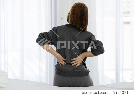 woman have a back pain 55340711