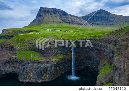 Aerial view of Mulafossur waterfall in Gasadalur Aerial view of Mulafossur waterfall in Gasadalur 55342110