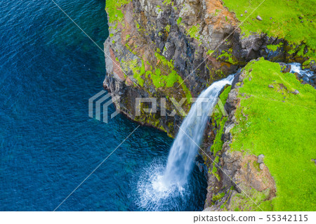 Aerial view of Mulafossur waterfall in Gasadalur Aerial view of Mulafossur waterfall in Gasadalur 55342115