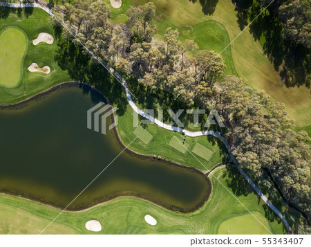 Aerial photo of green golf fields in spring Aerial photo of green golf fields in spring 55343407