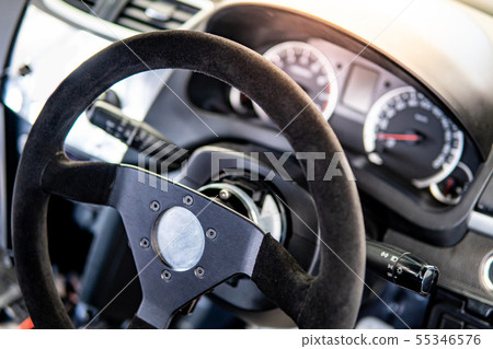 Steering wheel and dashboard of racing car 55346576
