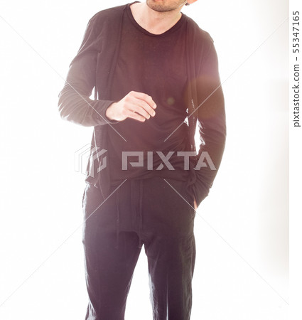 Elegant young handsome man in black clothing. Studio fashion portrait 55347165