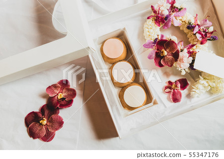 French profiteroles in gift box with flower for ocation. French profiteroles in gift box with flower for ocation. 55347176