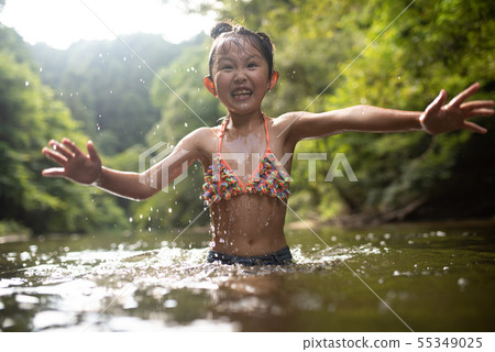 Girls playing on the river Girls playing on the river 55349025