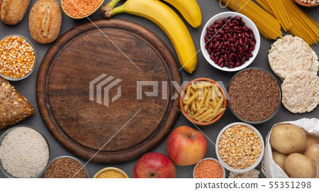 Gluten free food with grains and fruits around copy space Gluten free food with grains and fruits around copy space 55351298