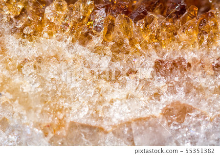 Citrine mineral close up. Gemstone background Citrine mineral close up. Gemstone background 55351382