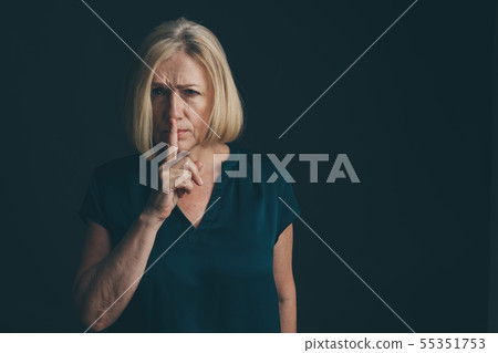 Woman showing to keep silence isolated. 55351753