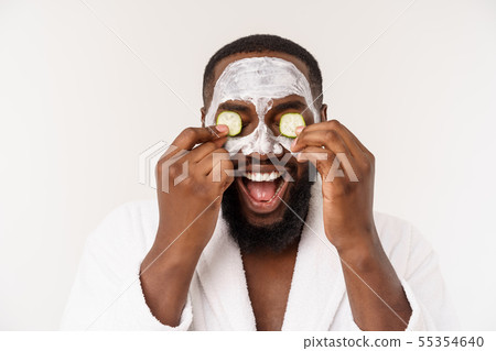 funny laughing man with mask leads healthy lifestyle, rejoicing at morning procedures. positive funny laughing man with mask leads healthy lifestyle, rejoicing at morning procedures. positive 55354640