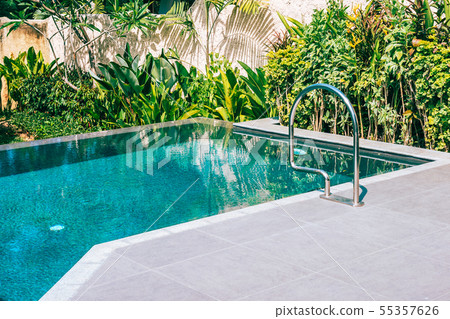 Beautiful landscape outdoor swimming pool in hotel and resort for leisure 55357626