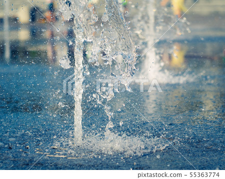 Water splashes on granite coating of dry fountain Water splashes on granite coating of dry fountain 55363774