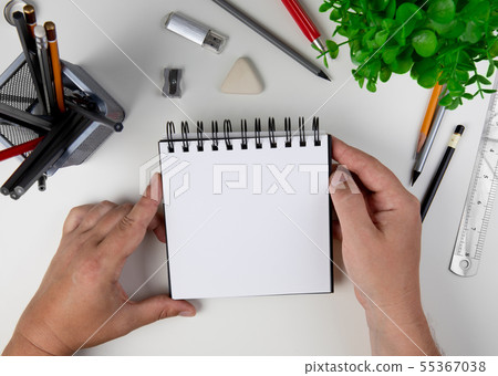 Human hand with pencil  55367038