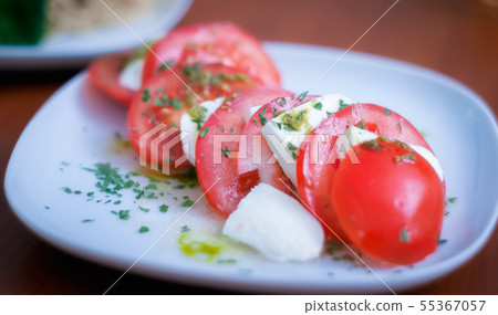 Italian speciality of mozzarella cheese and tomato 55367057