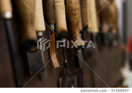 Tool of leather work that shoemaker uses 55369047