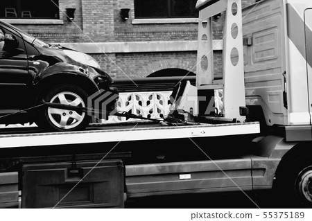 New car transported on tow trackm New car transported on tow trackm 55375189