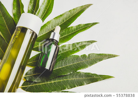 Hair Serum and shampoo. Natural care hair and skin. Concept hair restoration Hair Serum and shampoo. Natural care hair and skin. Concept hair restoration 55378838