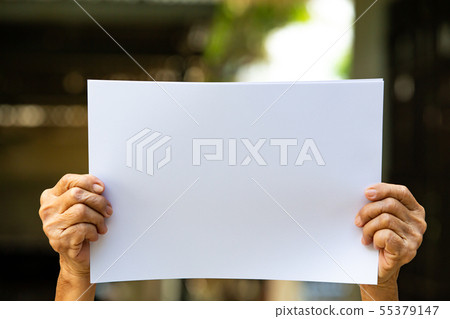 Senior woman's Hands women holding paper blank a4 55379147