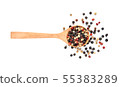 Peppers mixed in wood spoon isolated on white 55383289