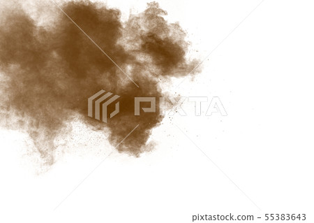Freeze motion of brown powder exploding on white. Freeze motion of brown powder exploding on white. 55383643