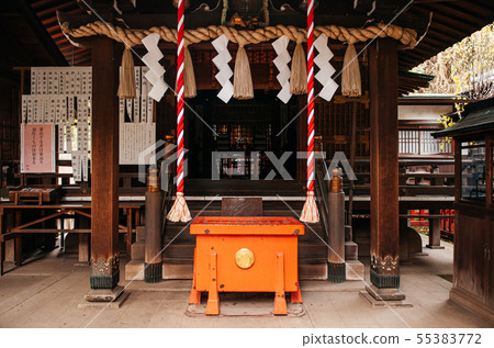 Shinto shrine prayer place with Shimenawa rope in 55383772