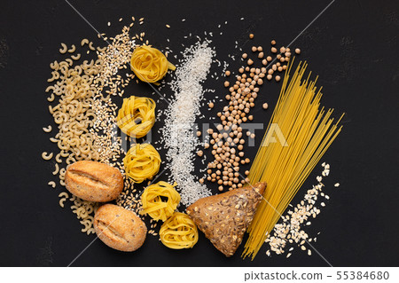 Creative flat lay of healthy food full of carbohydrates on black 55384680