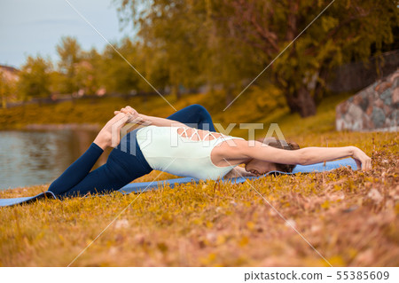 Slim brunette girl goes in for sports and performs Slim brunette girl goes in for sports and performs 55385609