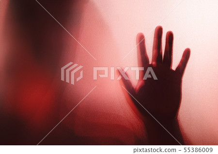 Shadow of the ghost hand behind frosted glass for Shadow of the ghost hand behind frosted glass for 55386009