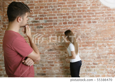 Young couple doing apartment repair together themselves Young couple doing apartment repair together themselves 55386470