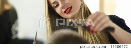 Young Hairdresser Cutting Male in Beauty Salon Young Hairdresser Cutting Male in Beauty Salon 55386472