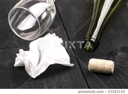 The used white crumpled paper napkin and an empty The used white crumpled paper napkin and an empty 55387210