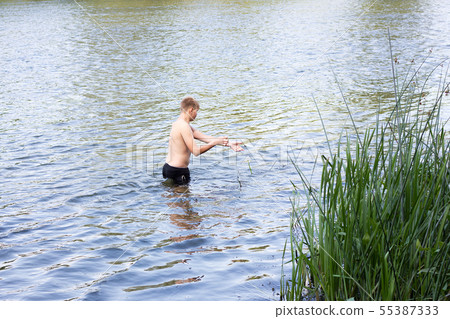 poachers collects nets in the spring season.  55387333