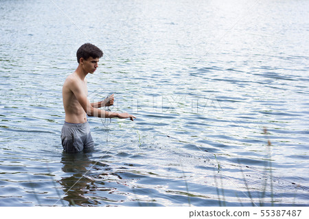 poachers collects nets in the spring season.  55387487