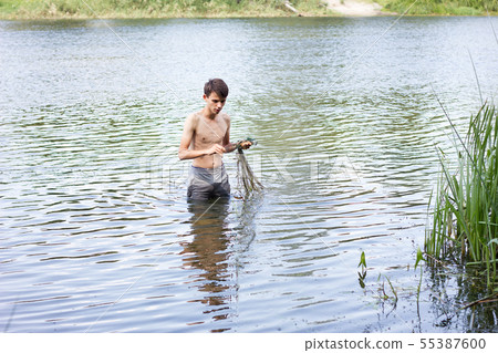 poachers collects nets in the spring season. poachers collects nets in the spring season. 55387600