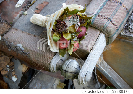 Bunch of rotten fruit and wilted flowers 55388324