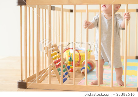 Baby playing in a baby circle 55392516