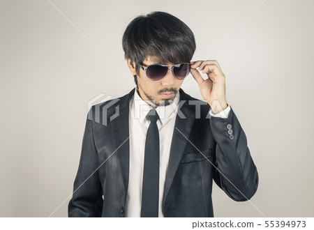 Portrait Businessman in Black Suit Touching Portrait Businessman in Black Suit Touching 55394973