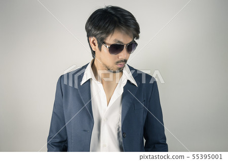 Portrait Man in Navy Blue Suit Wear Black Eyeglass Portrait Man in Navy Blue Suit Wear Black Eyeglass 55395001