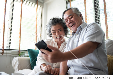 Happy Asian senior Couple using smartphone. 55396275