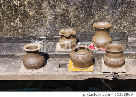 Clay pots made by hand of Thai traditional pottery 55396909