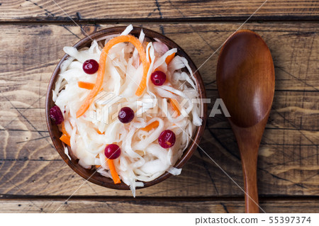 Homemade sauerkraut with carrots and cranberries  55397374