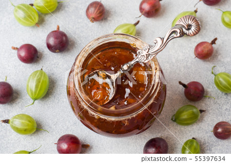 Gooseberry jam in a jar with fresh gooseberry 55397634